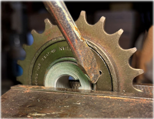 Removing the cover plate from an idler.