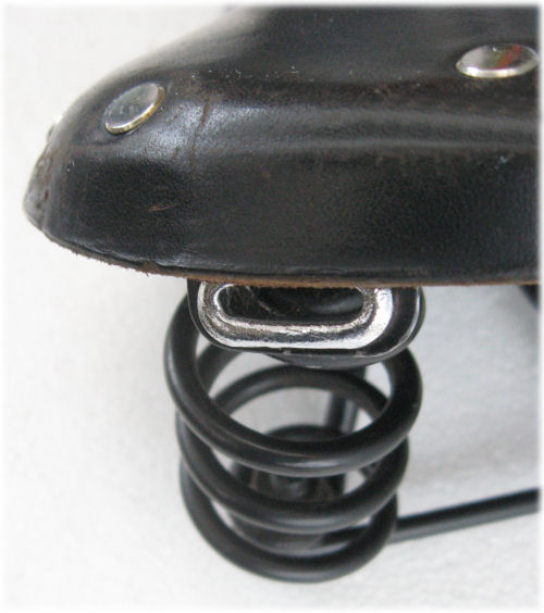 Saddle with eyelets