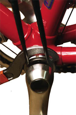 Three piece adjustable cup-and-cone bottom bracket
