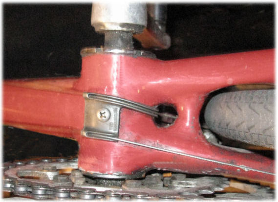 Cable guide under bottom bracket