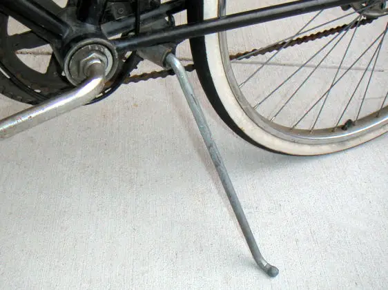 A kickstand whose pivot is welded to the frame. 